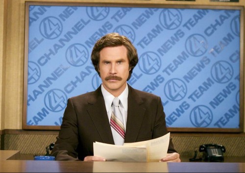 FILE - This 2004 file photo originally released by Paramount Pictures shows Will Ferrell as anchorman Ron Burgundy in "Anchorman: The Legend of Ron Burgundy."  Emerson College is changing the name of its school of communication. The college in Boston will rename the school for one day only, the Ron Burgundy School of Communication on Dec. 4 to honor the fictitious television anchorman. Ferrell, in character, is scheduled to share his path to journalism greatness with students. His visit will include a news conference, the renaming ceremony and a screening of Anchorman 2: The Legend Continues. Ferrell, as himself, will introduce the movie.  The sequel opens nationwide on Dec. 20. (AP Photo/Paramount Pictures, Frank Masi)